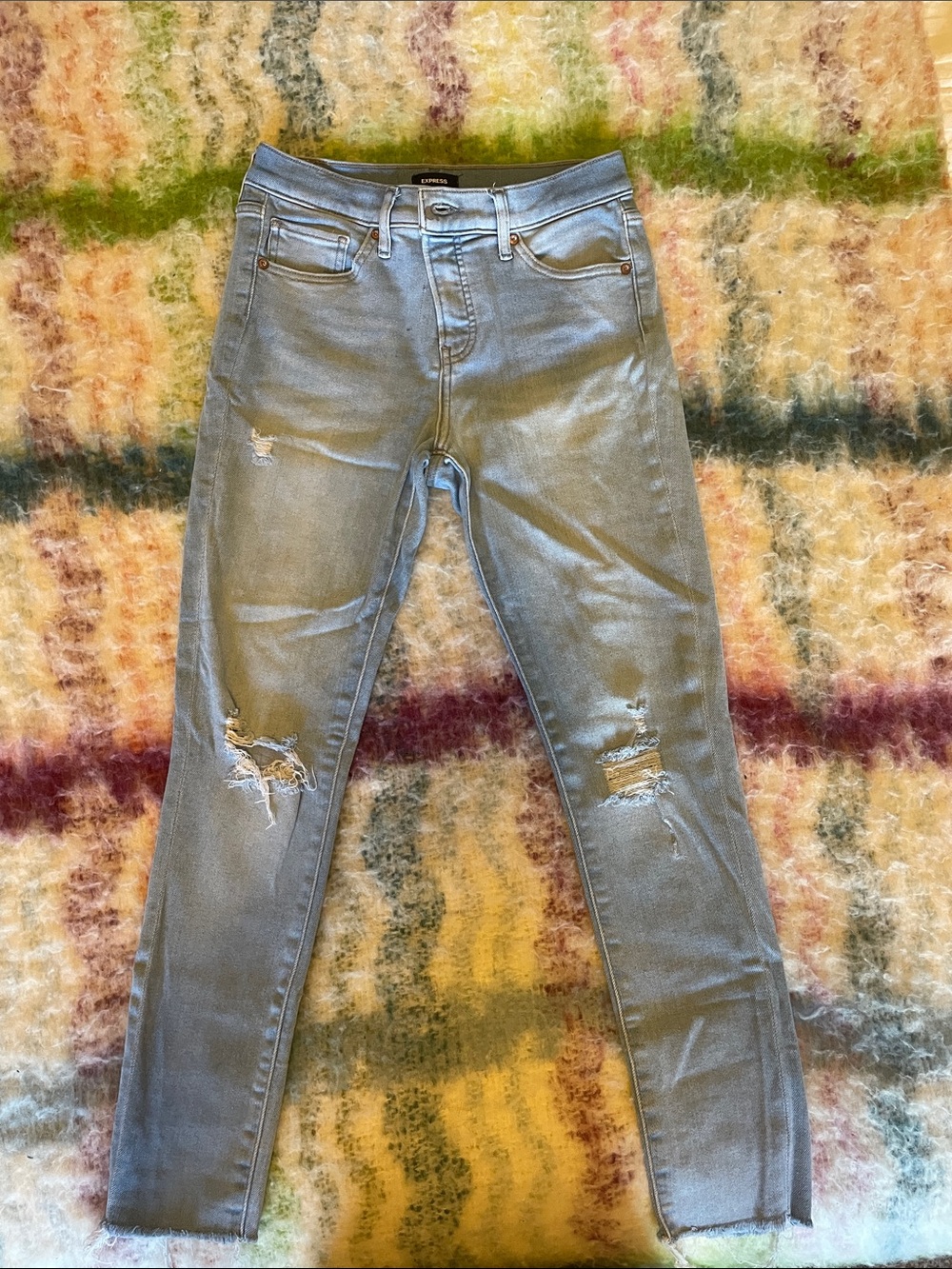 Express Women's Skinny Jeans in Light Blue with Distressed Knees